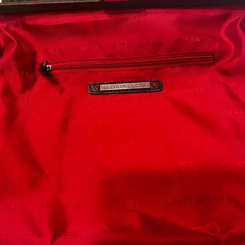 Elliott Lucca excellent used
